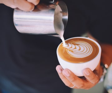 Edding milk to a cup of coffe
